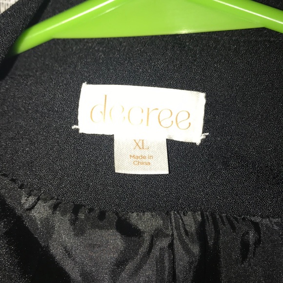 A black dress up jacket. - Picture 3 of 3